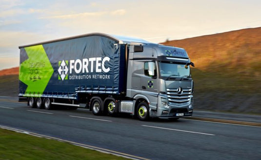 Pallet distribution of gravel parking grids via Fortec